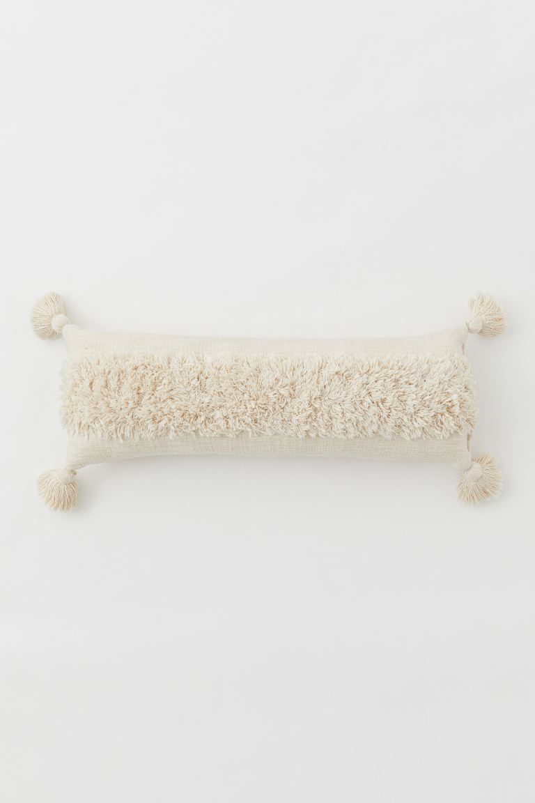 Tasselled rectangular cushion